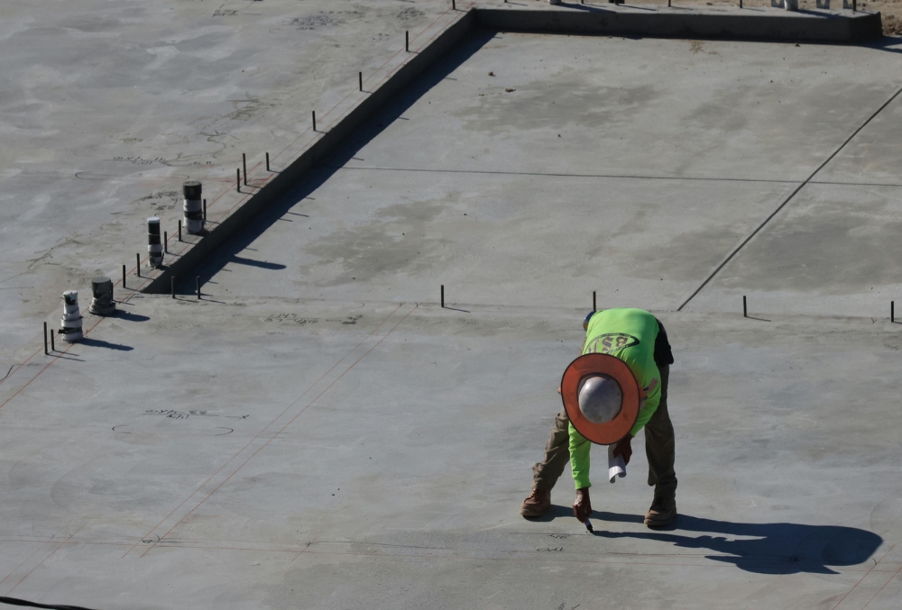 contractor working under bright sun